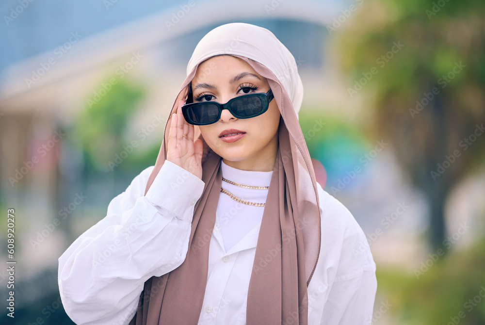 Portrait, fashion or sunglasses with an arabic woman outdoor in a cap