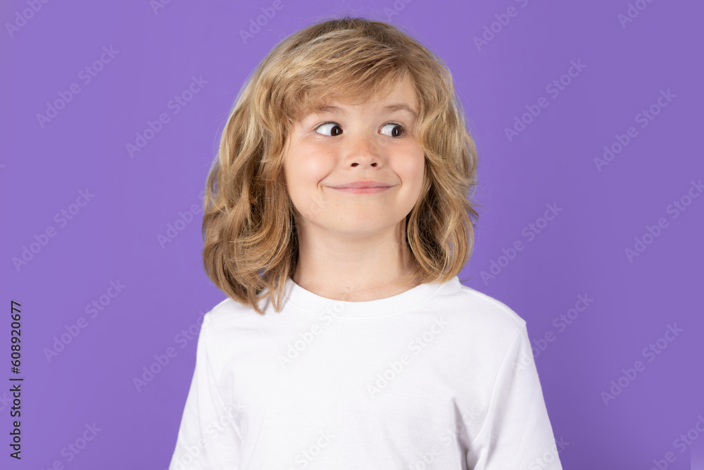 Fun child thinking on isolated background. Think and idea. Thoughtful kid studio portrait. Doubt and concerned kids expression. Looking away on copy space. Fun child thinking on isolated background. Think and idea. Thoughtful kid studio portrait. Doubt and concerned kids expression. Looking away on copy space.