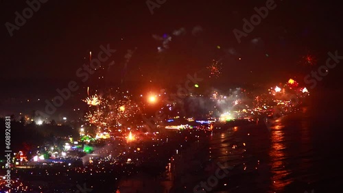 Fireworks on the sea at new year night in Arambol mountain Goa beach India