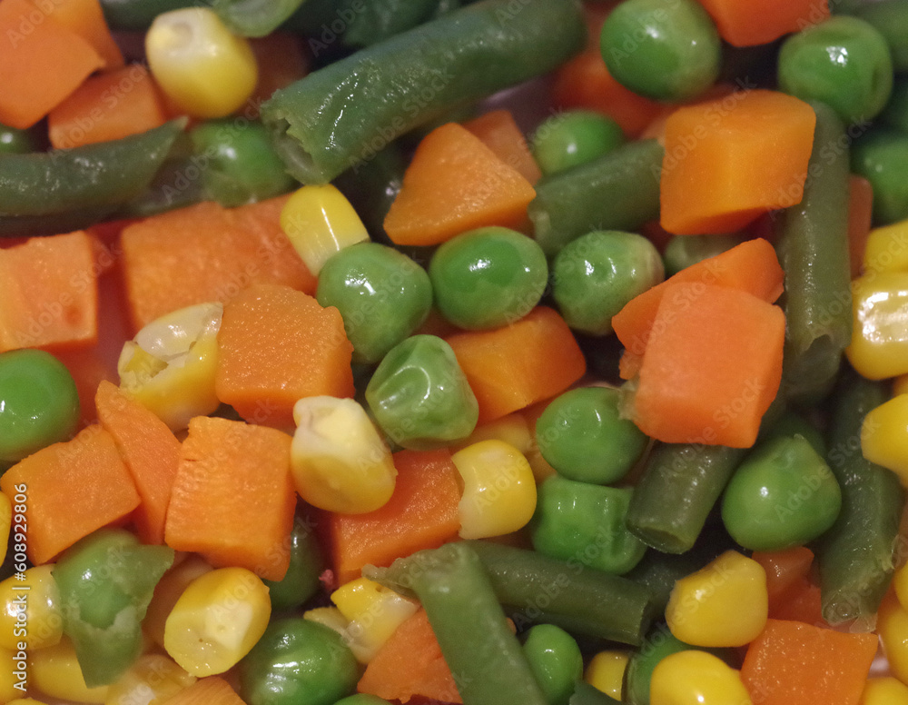 close up of mixed vegetables - peas, carrots, green beans close up of mixed vegetables - peas, carrots, green beans