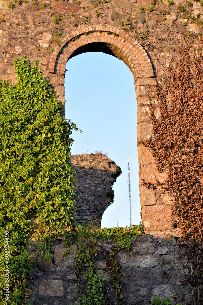 Old ruins of wheal frances mine buildings at sunset