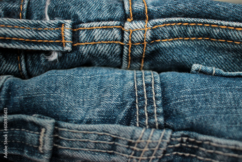 Jeans background, denim with seam of fashion design