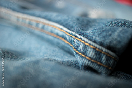 Jeans background, denim with seam of fashion design