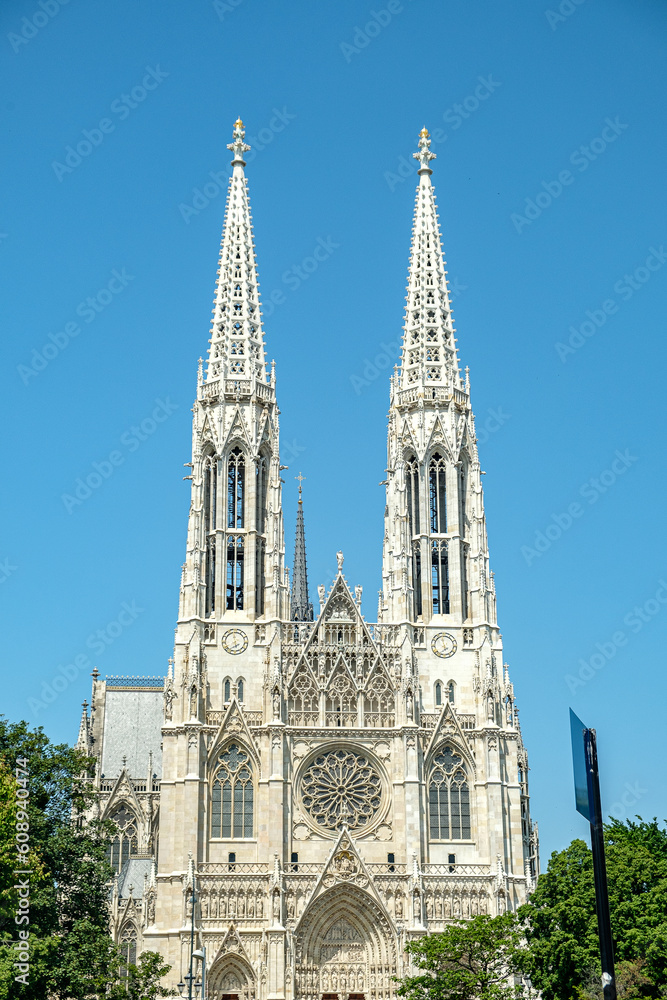 Votivkirche in Vienna on a sunny day. neo-Gothic style Votivkirche in Vienna on a sunny day. neo-Gothic style