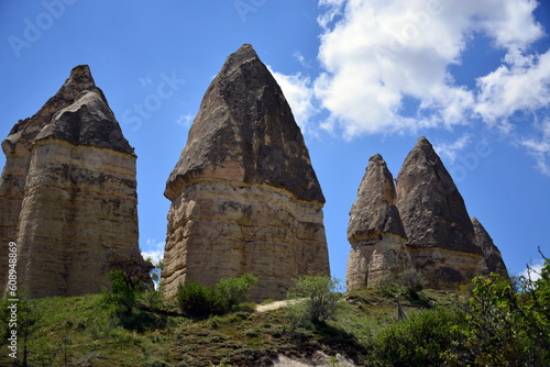 Turkiye, Goreme, positioned between the rock formations called fairy chimneys, between valleys and rock churches. Declared a UNESCO World Heritage Site