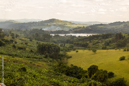 Lush rural landscape with Nyabikere lake near Fort Portal, Uganda photo