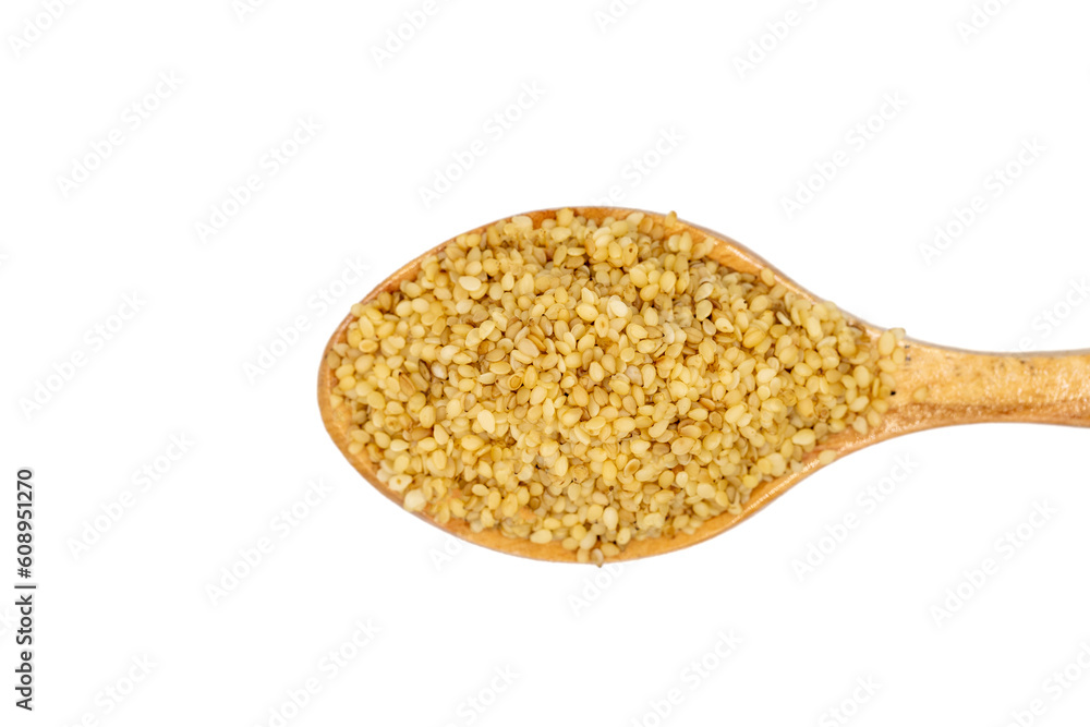 Sesame on wooden spoon. Sesame seeds isolated on a white background. Top view Sesame on wooden spoon. Sesame seeds isolated on a white background. Top view