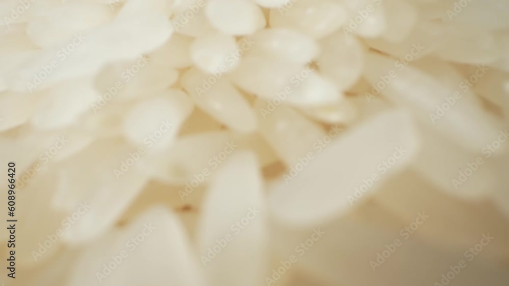 In this dynamic macro video, the pouring of jasmine rice becomes a captivating dance. The camera follows the rice as it flows from above, capturing its graceful movement. Food and Slow motion concept
In this dynamic macro video, the pouring of jasmine rice becomes a captivating dance. The camera follows the rice as it flows from above, capturing its graceful movement. Food and Slow motion concept