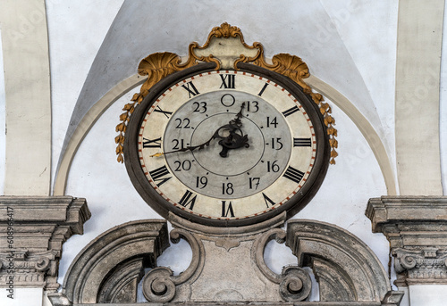 The old clock above the entrance of the 