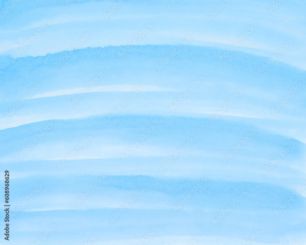 Abstract blue watercolor background. The color splashing on the paper. Hand drawn.