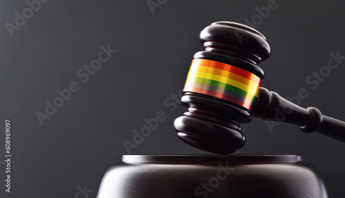 Conceptual detail of judge mace with lgbt flag colors