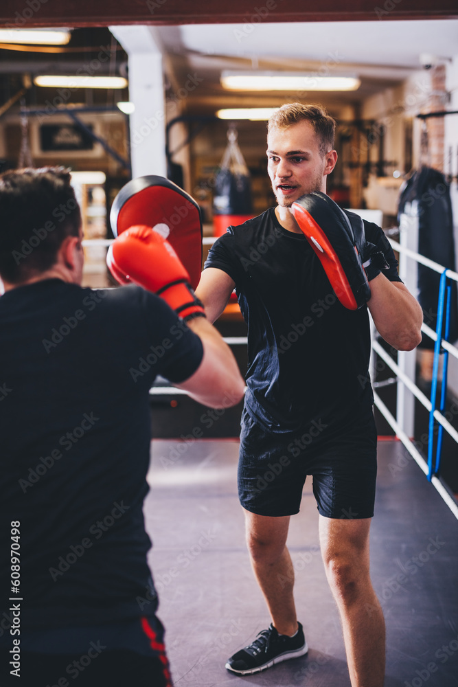 Boxers do boxing training on a gym Boxers do boxing training on a gym