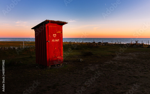 old toilette house in sweden, sweden style, ocean, baltic sea, wc