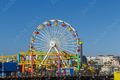Los Angeles, California, USA, June 21, 2022: The Pacific Park is an oceanfront amusement park located on the Santa Monica Pier, that looks directly out on the Pacific Ocean.