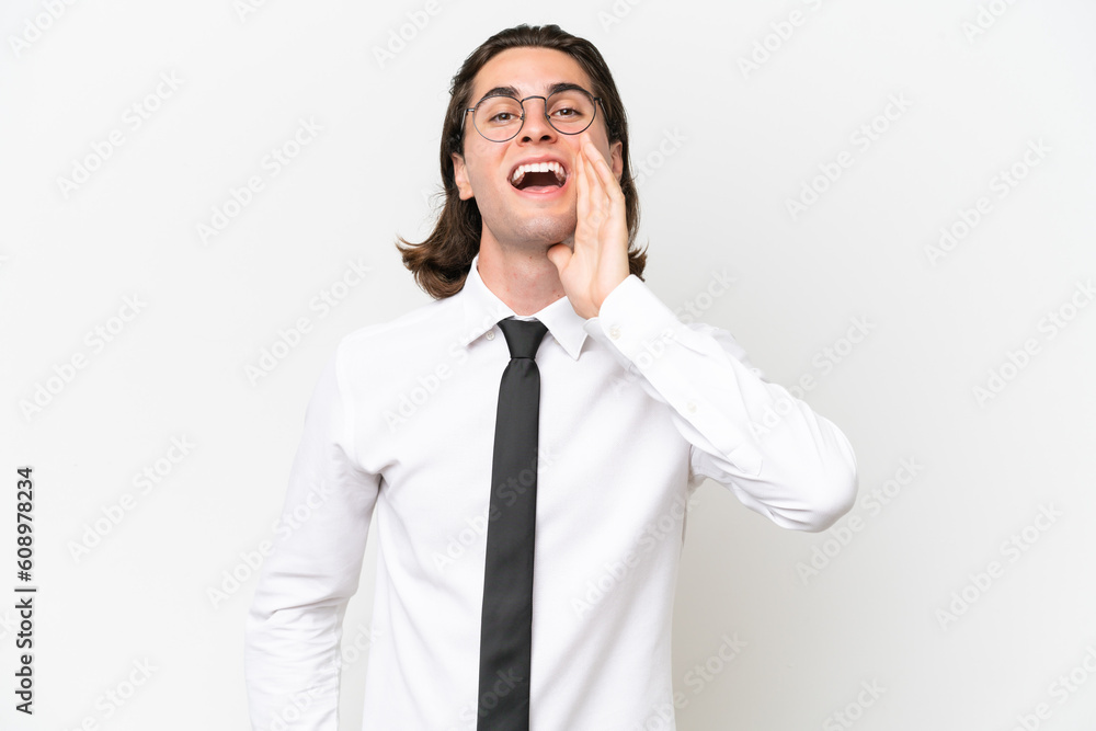 Business handsome man isolated on white background shouting with mouth wide open Business handsome man isolated on white background shouting with mouth wide open