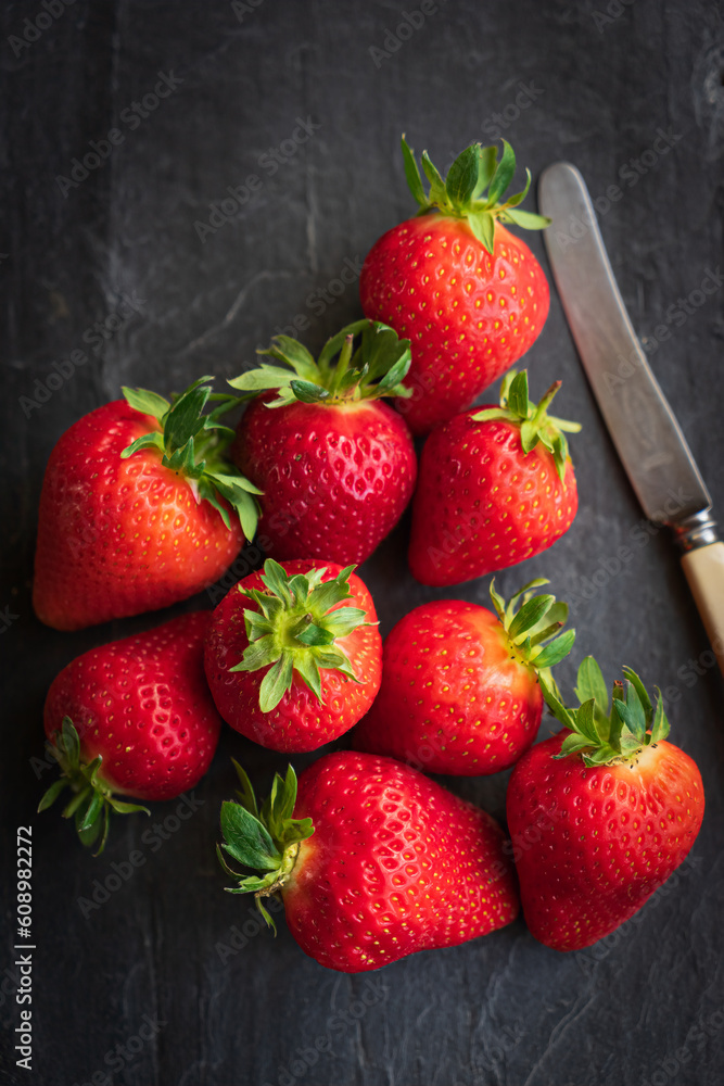 Strawberries on a slate background Strawberries on a slate background
