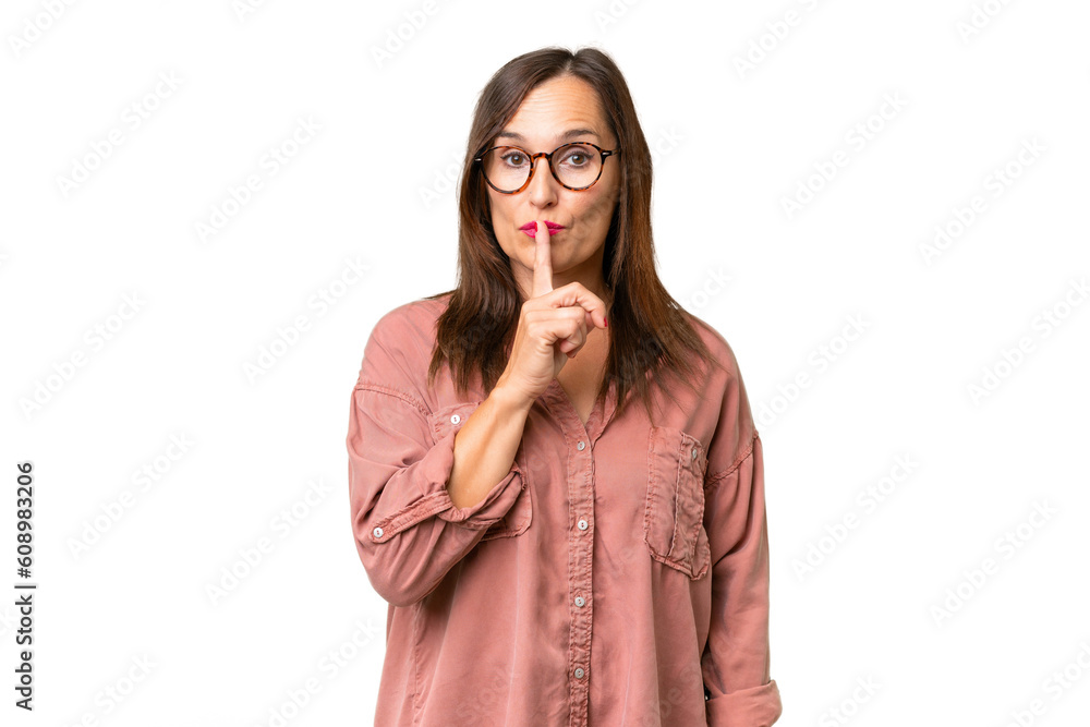 Middle-aged caucasian woman over isolated background showing a sign of silence gesture putting finger in mouth