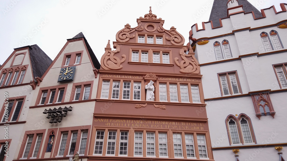 Fototapeta premium Trier, Germany, November 27, 2022: On the Hauptmarkt, the Rotes Haus was the house of the bakers' guild master and secretary of the cathedral chapter, Johann Wilhelm Polch.