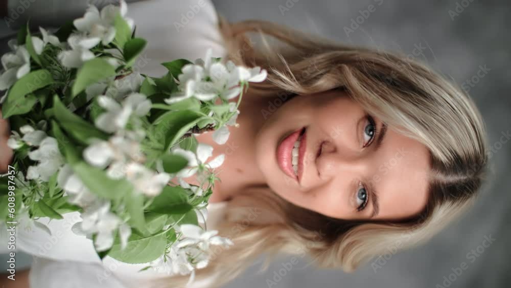 VERTICAL VIDEO POV romantic young blonde woman enjoy smell fragrance aroma white flowers bouquet VERTICAL VIDEO POV romantic young blonde woman enjoy smell fragrance aroma white flowers bouquet