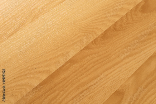 brown artificial floorboards with visible texture. background