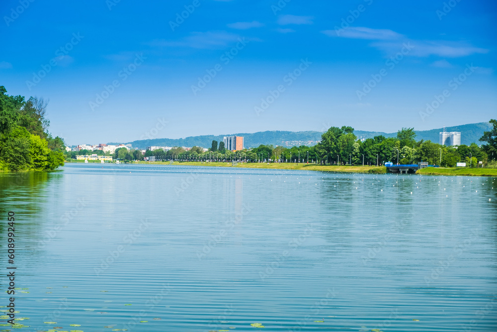 Shore of Jarun lake in Zagreb, Croatia, sunny summer day, tourist destination
