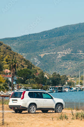 suv car at the beach of sea bay Lefkada island