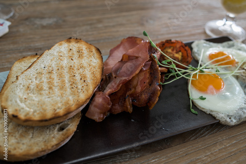 Grilled  egg and bacon breakfast 