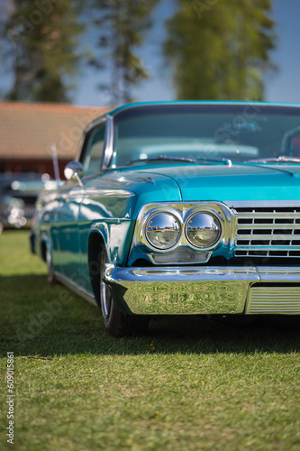 American car, headlight on blue old retro car © Emeli Zettergren
