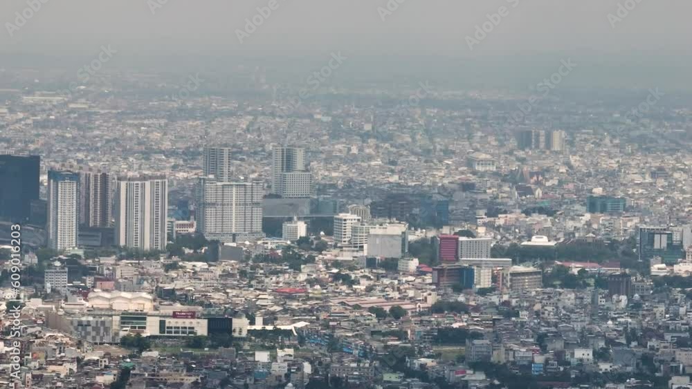 Medan city with residential areas and houses view from above. Sumatra, Indonesia. Medan city with residential areas and houses view from above. Sumatra, Indonesia.