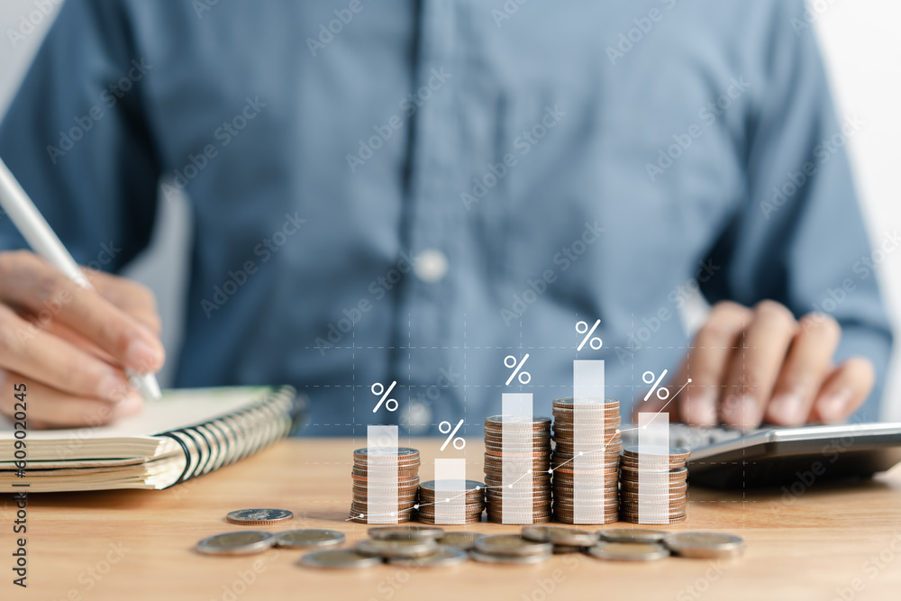 Φωτογραφία Businessman stacking money coins accounting for increase financial interest rate and business investment growth from dividend, Business Finance and Money, Save money for prepare in the future