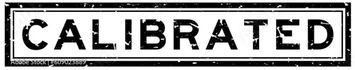 Grunge black calibrated word square rubber seal stamp on white background