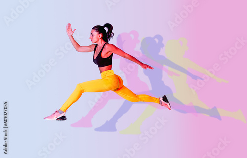 Sportive woman training on a colorful background - Athletic fit adult female doing functional training fitness workout in a studio