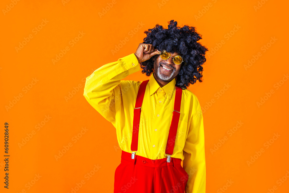 Cool senior african man with fashionable outfit portrait - Old and funny black grandfather portrait on colorful background Cool senior african man with fashionable outfit portrait - Old and funny black grandfather portrait on colorful background