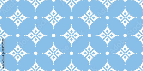 Christmas seamless pattern with white stars on blue background.  Vintage pattern for fabric or wrapping. Textile design. Stylish background for cards. Seamless pastel template. Retro ornament.