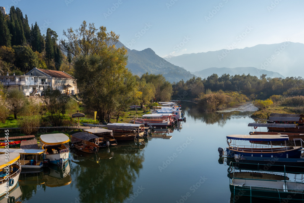 Tourist boats parked up near the Lake Skadar visitors centre in Montenegro.