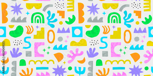 Abstract organic shape seamless pattern with colorful geometric doodles. Flat cartoon background, simple random shapes in bright childish colors. 
