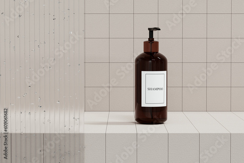 Amber pump bottle with white label mockup for bathing products in bathroom. Blurred foreground of glass panel with water drops. Beige tiles background. Brown glass jar hand lotion or hair shampoo photo