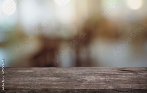 Empty wood table top and blur of out door garden background Empty wooden table space for text marketing promotion. blank wood table copy space for background