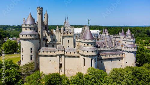 Aerial view of the Castle of Pierrefonds in the forest of CompiÃ¨gne, Picardy, France - Medieval castle restored by the French architect EugÃ¨ne Viollet-le-Duc in the 19th Century