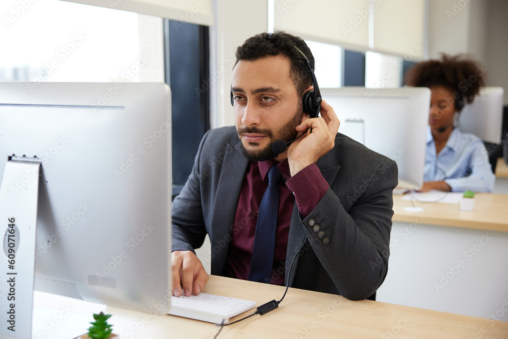 operator or businessman wearing headphones and talking online with customer at call center service in the office operator or businessman wearing headphones and talking online with customer at call center service in the office