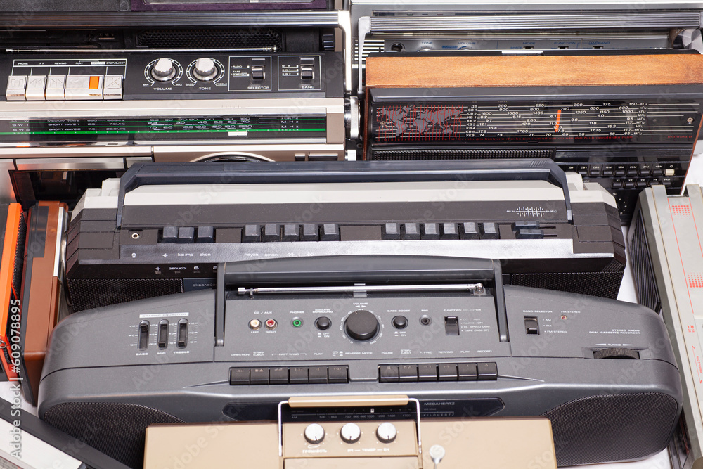 Collection of old tape recorders and transistor radio Collection of old tape recorders and transistor radio