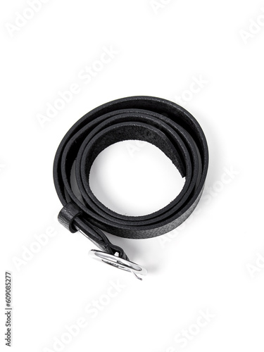 Black leather belt on white background. Twisted belt. Top view