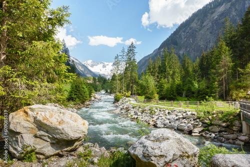 Wanderweg entlang eines Gebirgsbaches im Stilluptal in Österreich photo