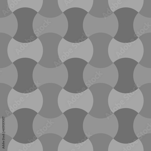Apple core quilts texture. Patchwork motif. Seamless surface pattern design with ethnic ornament. Grey interlocking axehead figures background. Digital paper with hammerhead shapes for textile print.