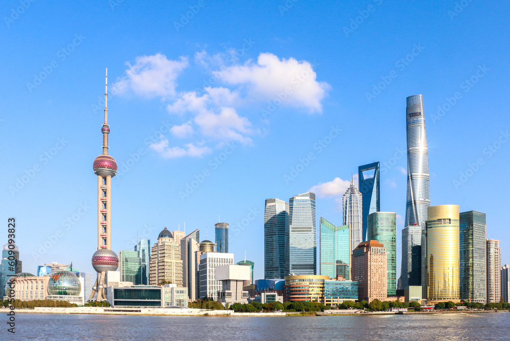 Obraz premium The Iconic Shanghai Skyline featuring modern buildings of the Lujiazui Cityscape, the commercial and business center of one of China’s tier one cities