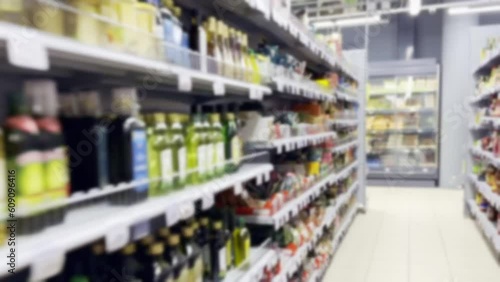Wallpaper Mural Choosing a dairy products at supermarket.Grocery stores .blurred background Torontodigital.ca