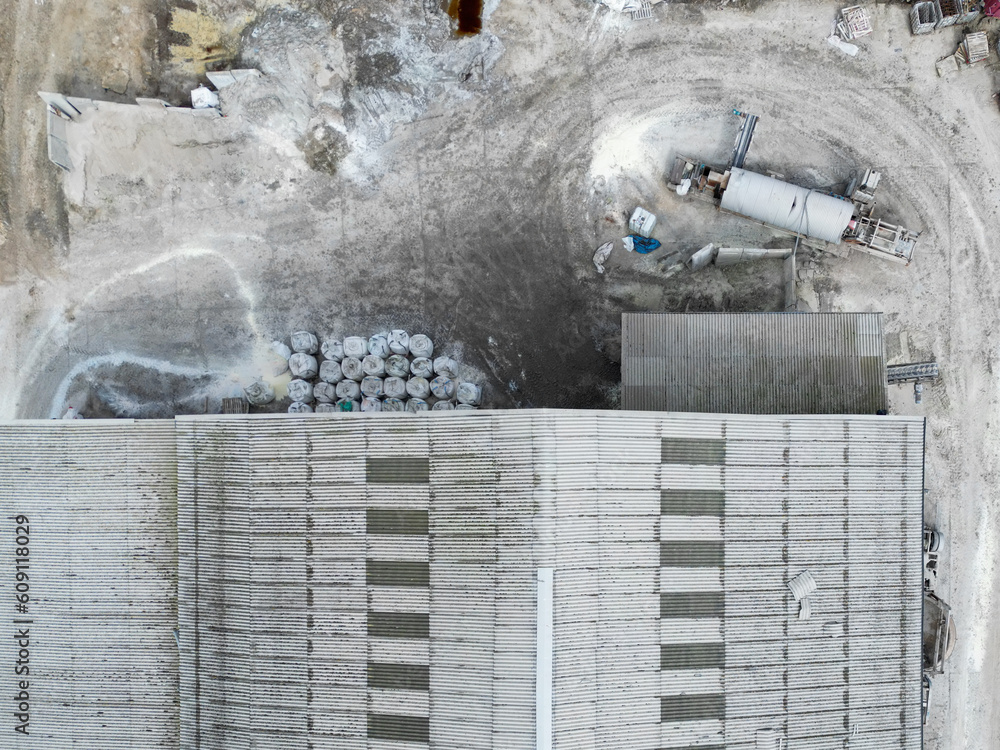 Drone top down view of a newly constructed agricultural warehouse
