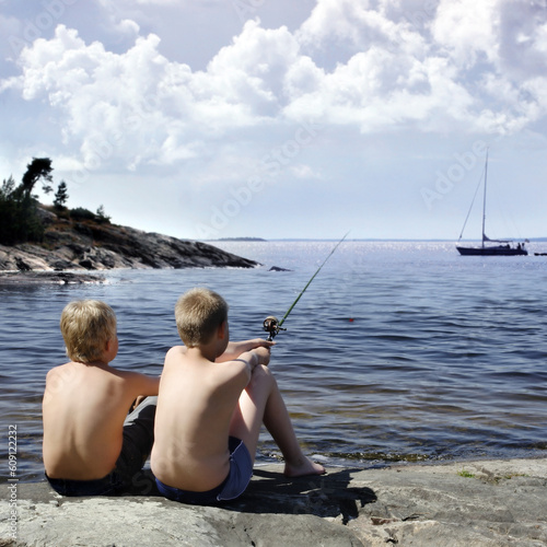 Two boys fishing, sweden