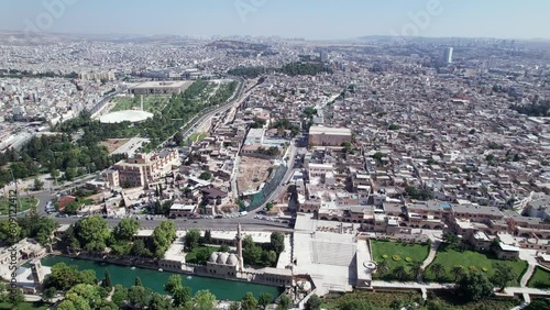 Aerial view of Sanliurfa Castle, rooftops, park around Balikligol and Mevlidi Halil Mosque. Historical and most visited part of Sanliurfa city, southeastern Anatolia, Turkey photo