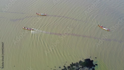 aerial landscape view of wooden boats moving in chilika lake HD photo